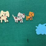 Felt dogs covered in Mud