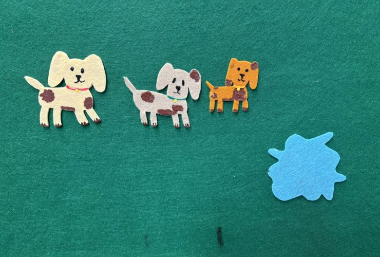 Felt dogs covered in Mud